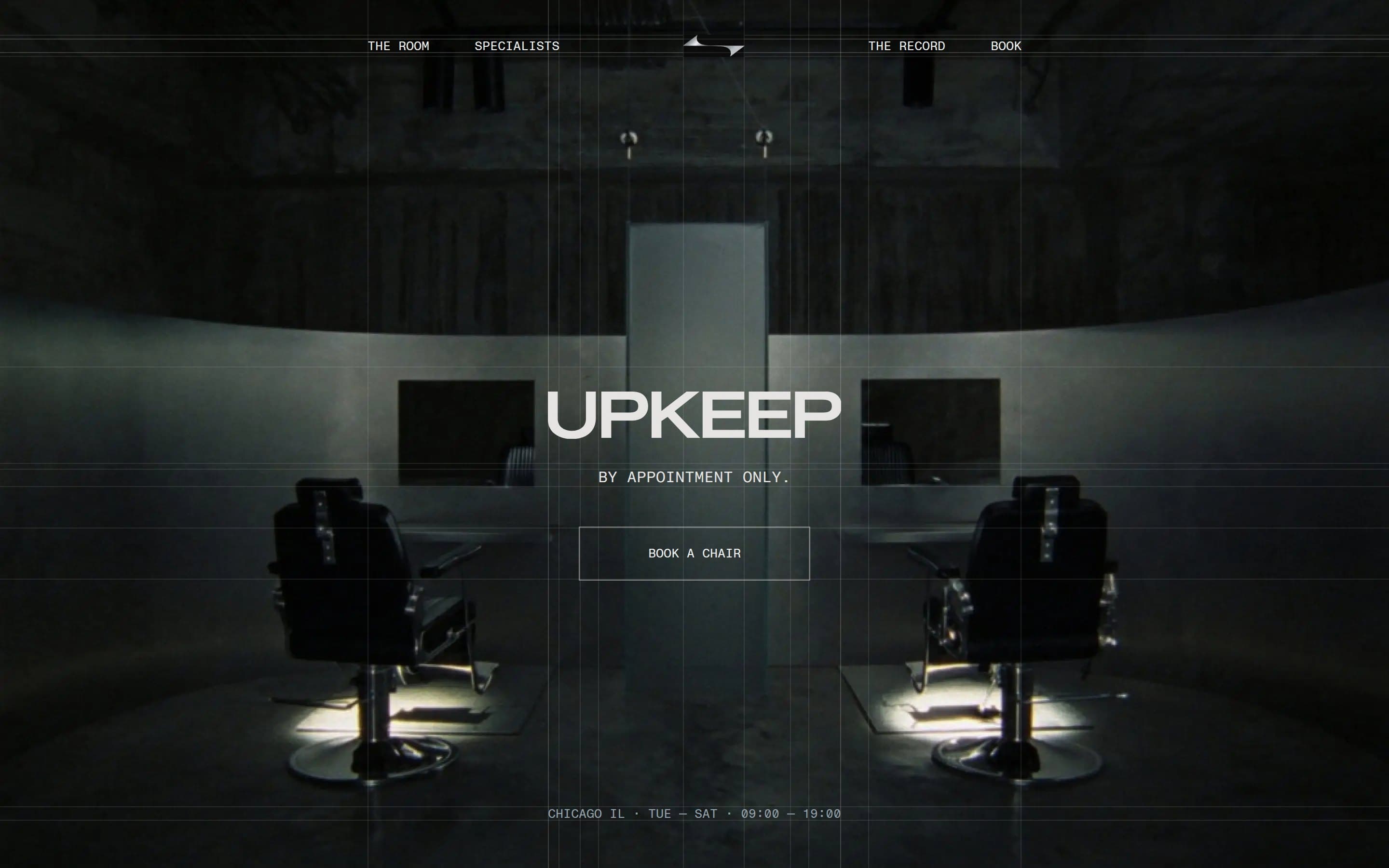 The UPKEEP booking site's home screen: two barber chairs under spotlights either side of a frosted divider, the UPKEEP wordmark, BY APPOINTMENT ONLY and a BOOK A CHAIR button, with hairline guides on every edge of the type.