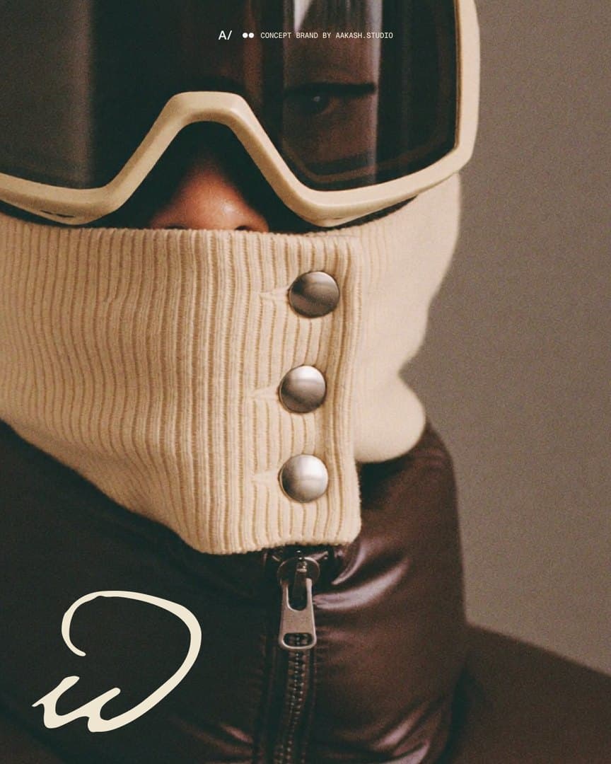 Detail slide: the three steel snaps of the knit gaiter close up, with the small w in the corner.